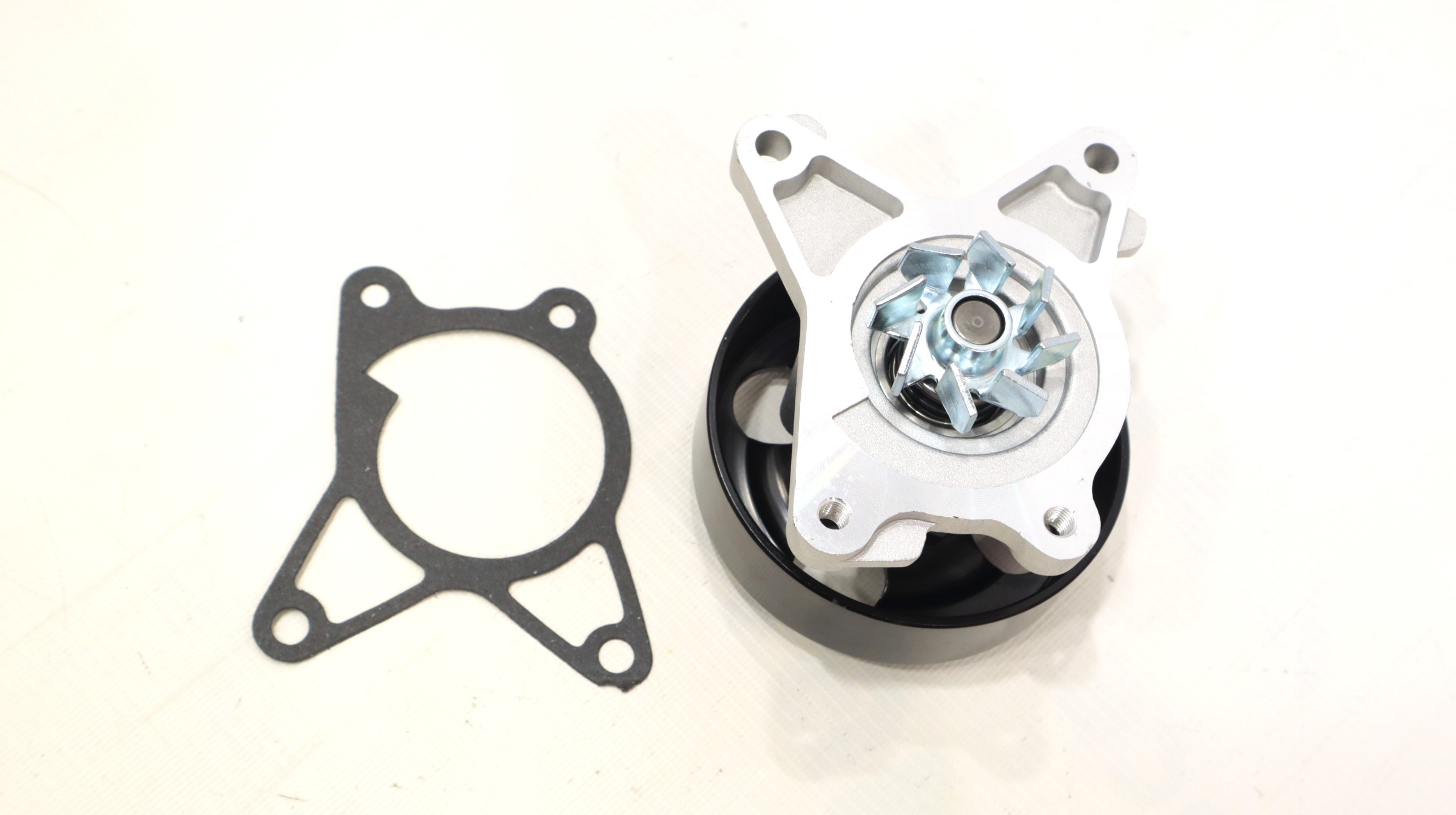 Насос водяной NISSAN X-TRAIL 07- 2.0 TATSUMI